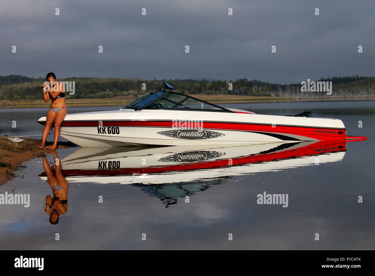 Girl on a speedboat at Paradise Dam in Queensland Australia Stock Photo