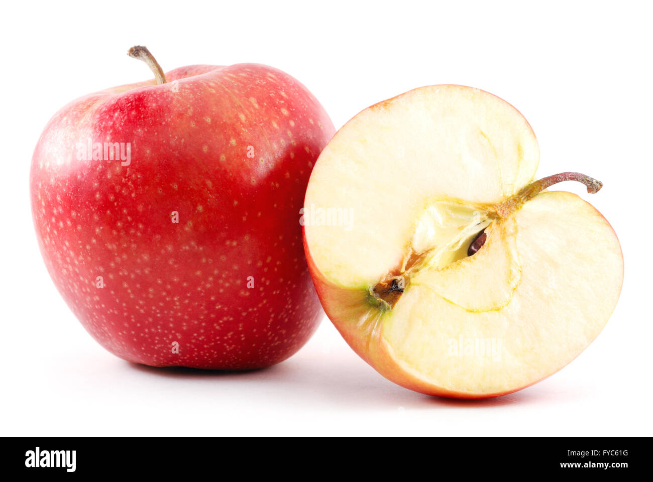 red apple and its half isolated on white Stock Photo