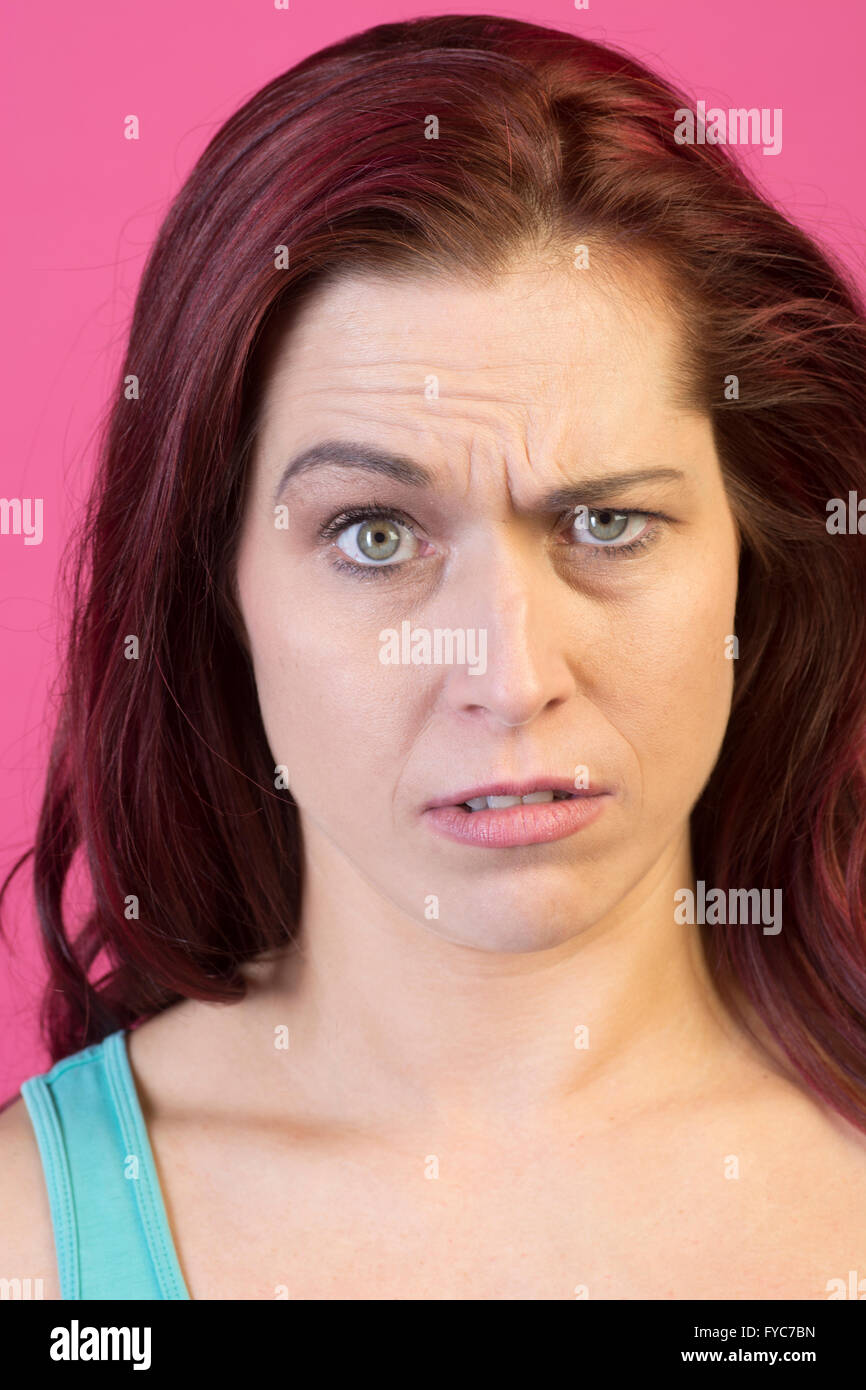 Woman with a confused expression Stock Photo