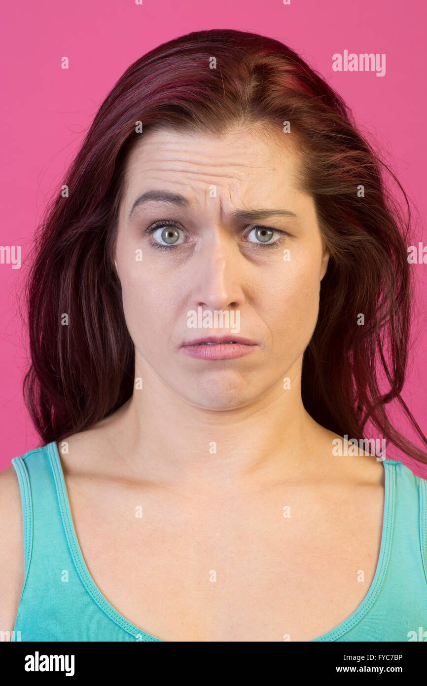 Woman with a confused expression Stock Photo