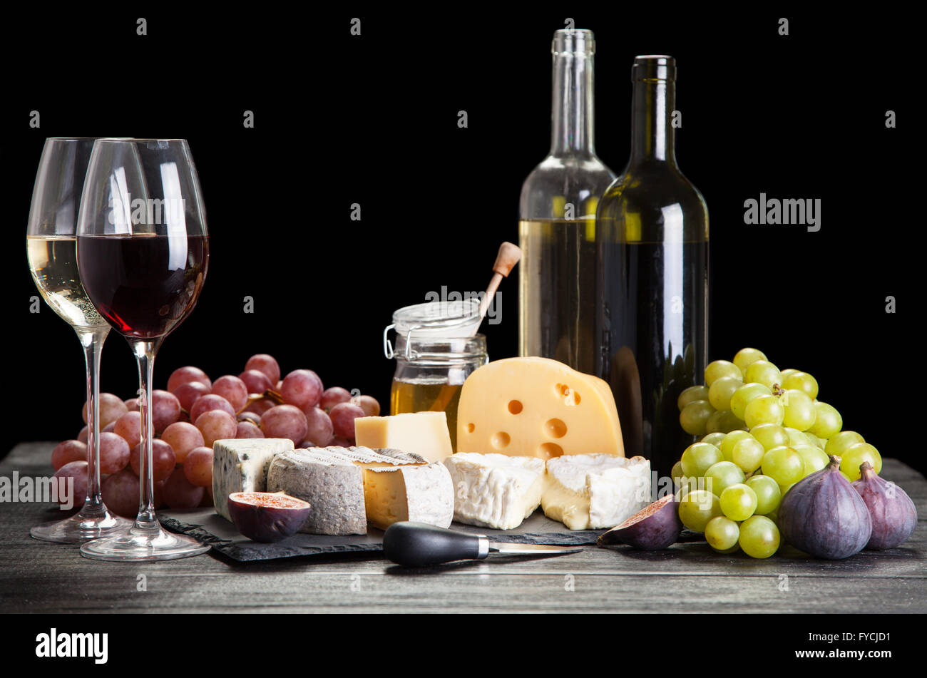 Wine, grapes and cheese Stock Photo