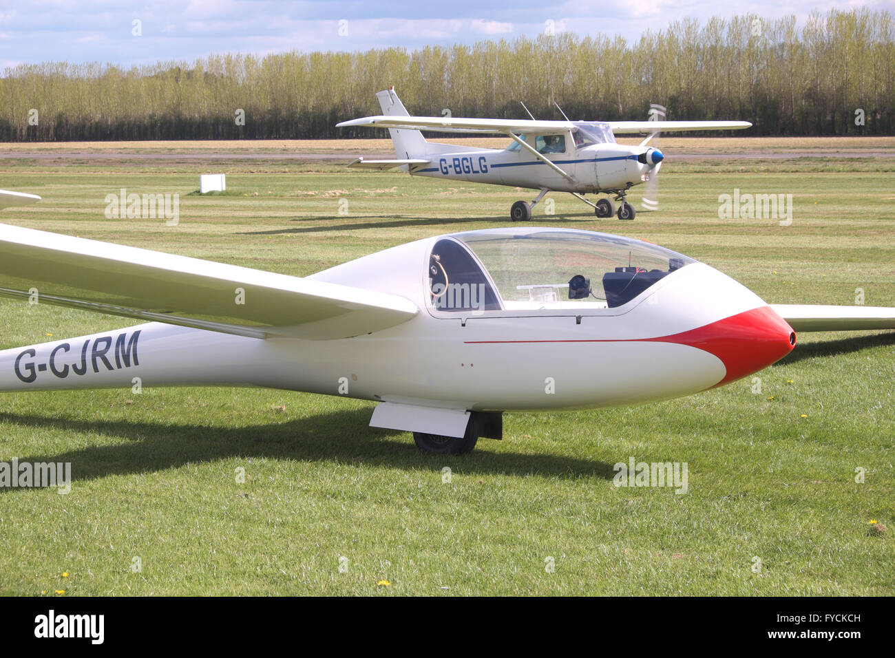 Glider and Cessna 152 basic trainer aircraft at Shobdon airfield in