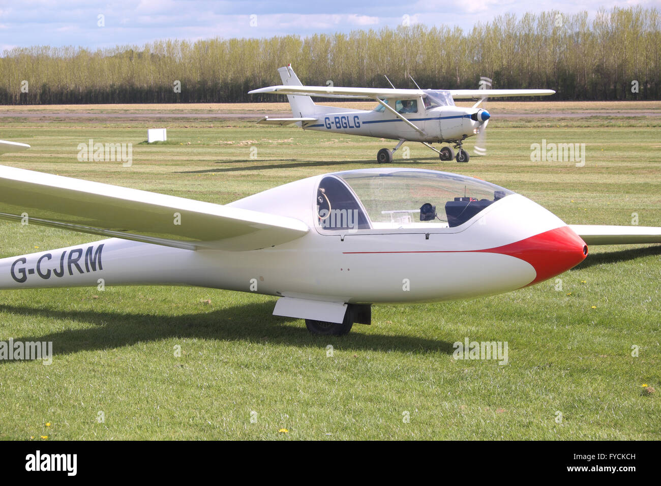 Glider and Cessna 152 basic trainer aircraft at Shobdon airfield in Herefordhire UK Stock Photo