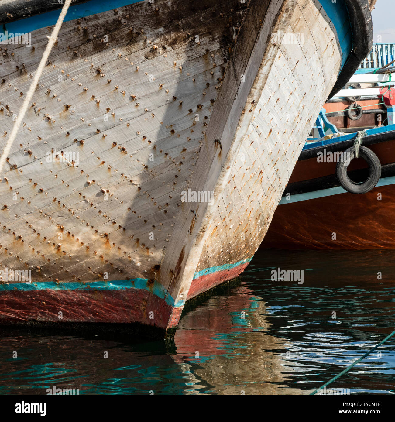 Prow of wooden dhow docked in Dubai River near Al Ras, Dubai, UAE Stock Photo