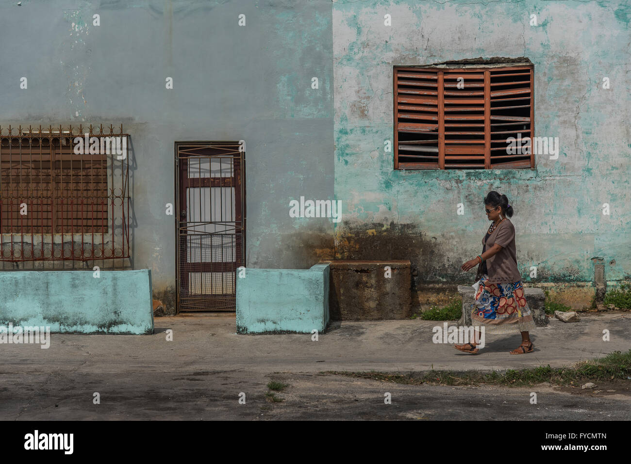 Local Cuban people going about their daily lives in the streets of Old ...