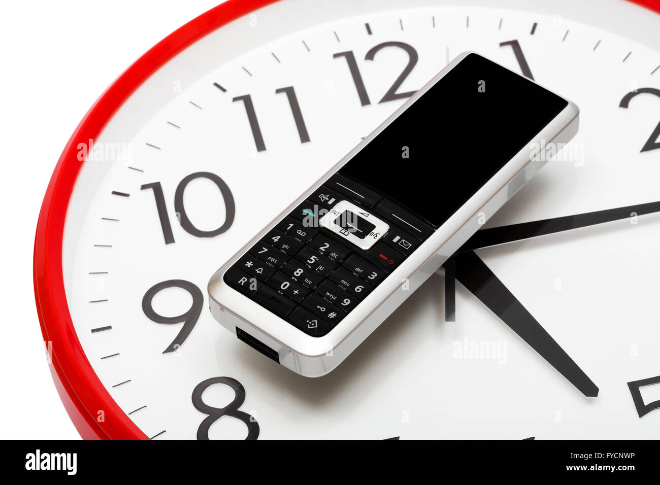 Modern phone on a dial of clock Stock Photo Alamy