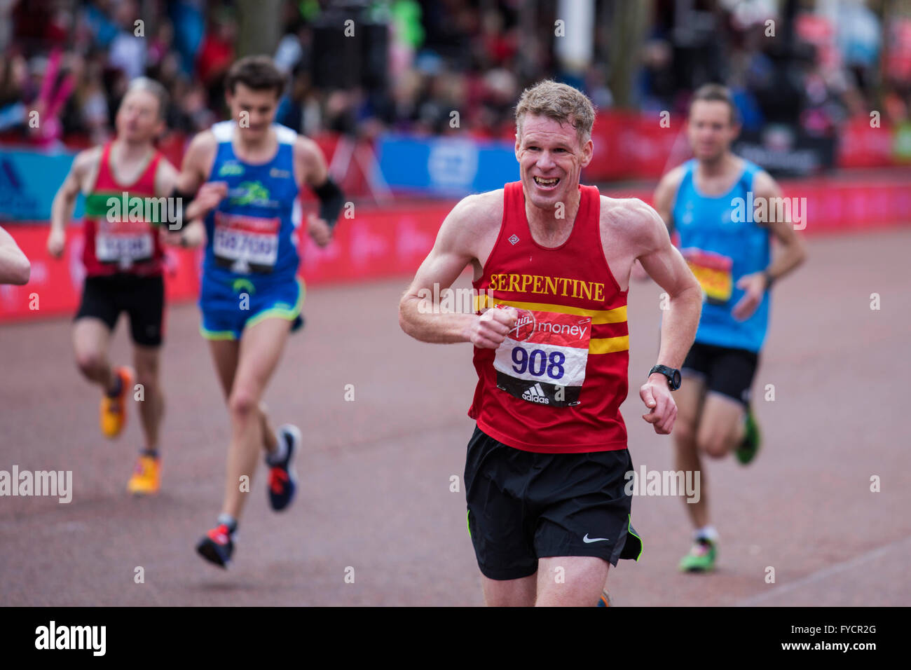 London, UK. 24 April 2016. Club runners on the Mall. The 2016 Virgin Money London Marathon finishes on the Mall, London, United Kingdom. Stock Photo