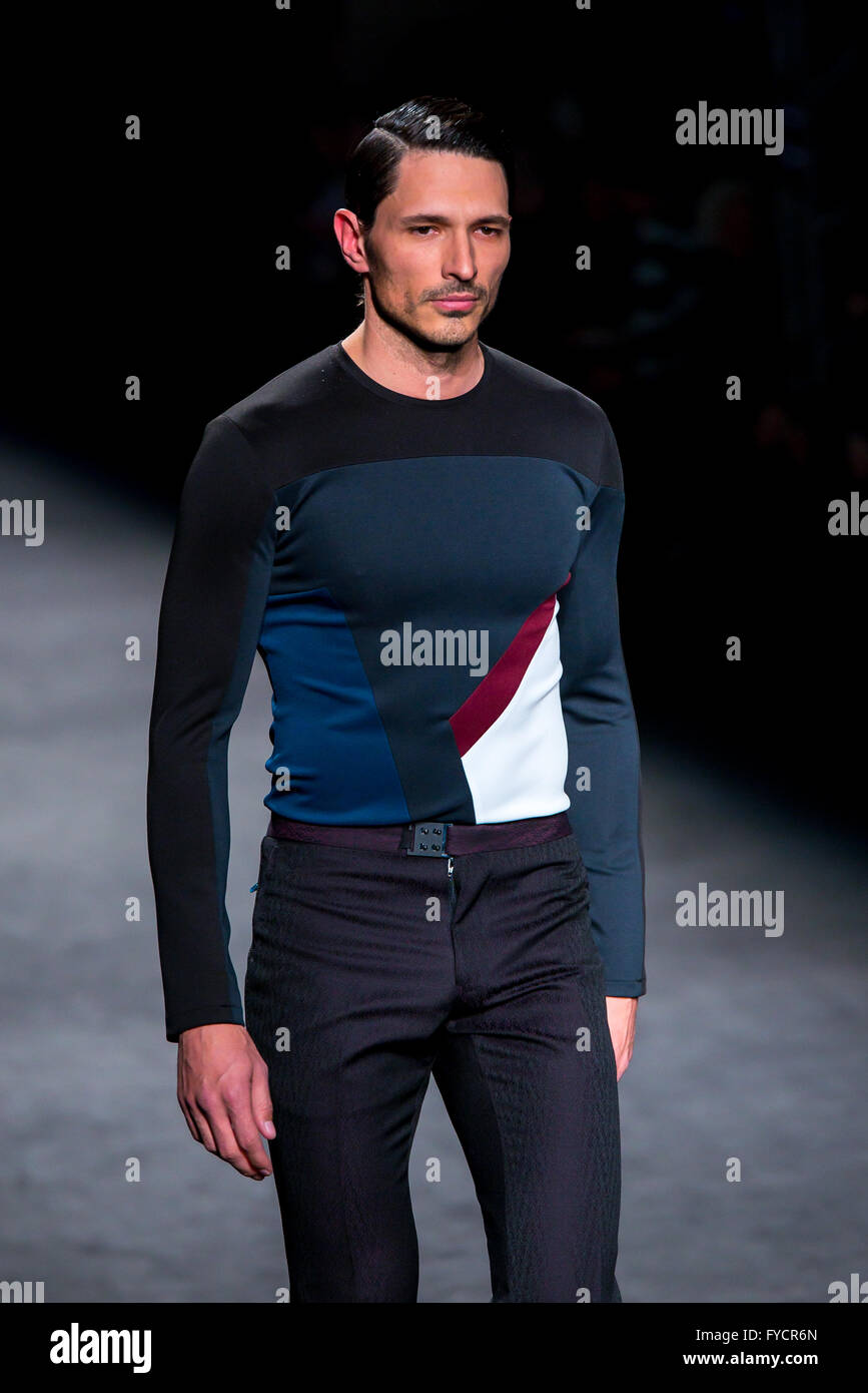 BARCELONA - FEB 4: Andres Velencoso (model) walks the runway for the Miquel Suay collection at the 080 Barcelona Fashion. Stock Photo
