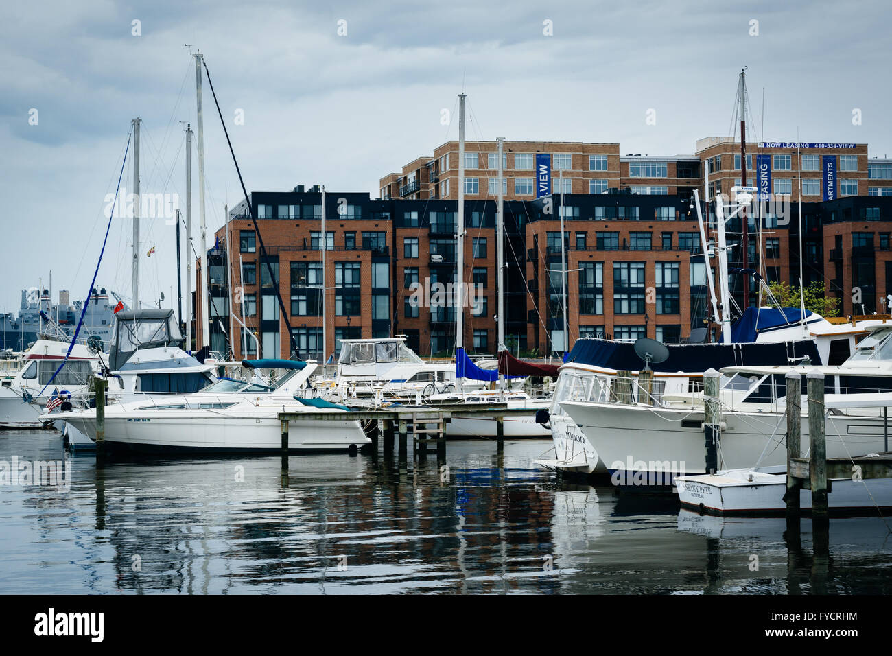 Boats and buildings on the waterfront in Fells Point, Baltimore, Maryland. Stock Photo