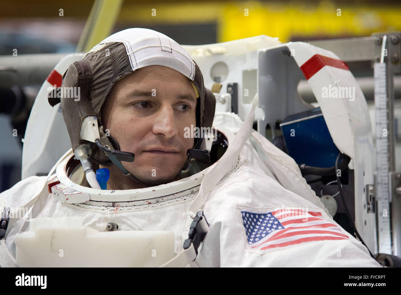 NASA astronaut Andrew Morgan in his Extravehicular Mobility Unit space suit during ISS EVA training at the Neutral Buoyancy Laboratory Johnson Space Center February 27, 2015 in Houston, Texas. Stock Photo