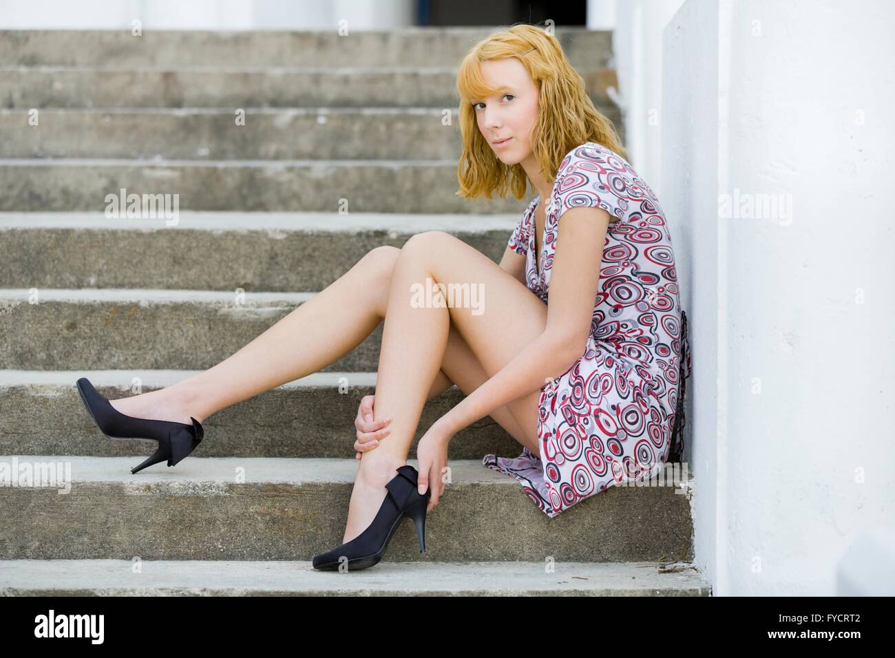 Slender Teen Girl Sitting On Staircase Holding Leg Shoe With Hands Mini Short Dress Mini Dress Minidress Stilettos Stiletto Fatigue Fatigued Slender Teen Girl Sitting On Staircase Holding Leg Shoe With Hands Mini Short Dress Mini Dress Minidress Stilettos Stiletto Fatigue Fatigued