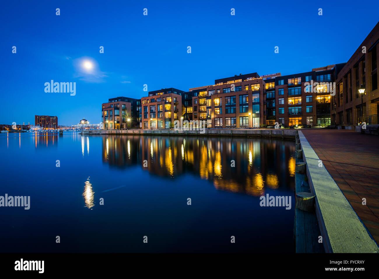 The full moon over a waterfront apartment building in Fells Point