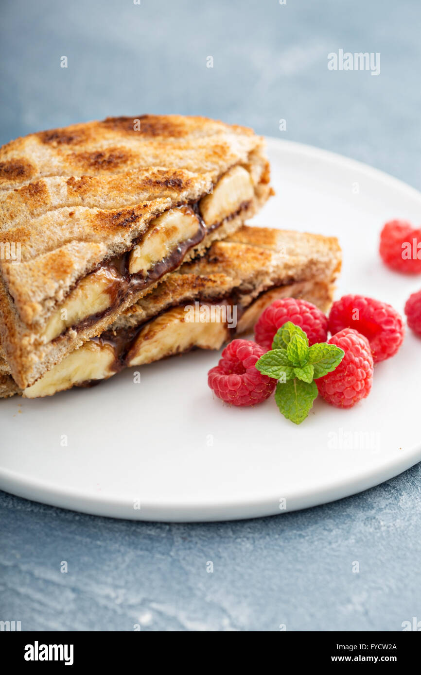 Grilled banana and chocolate sandwich Stock Photo