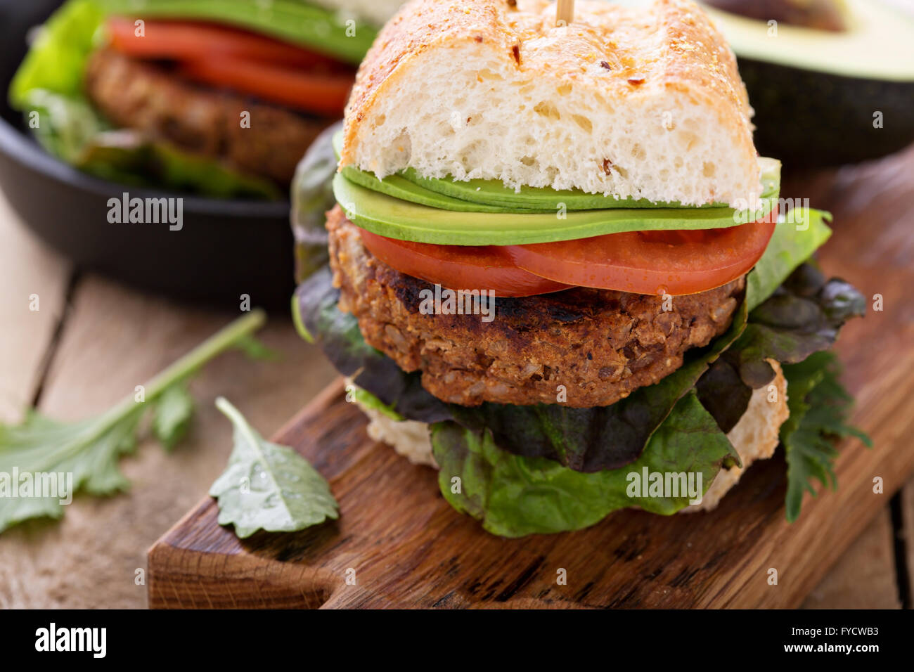 Vegan burgers with beans and rice Stock Photo