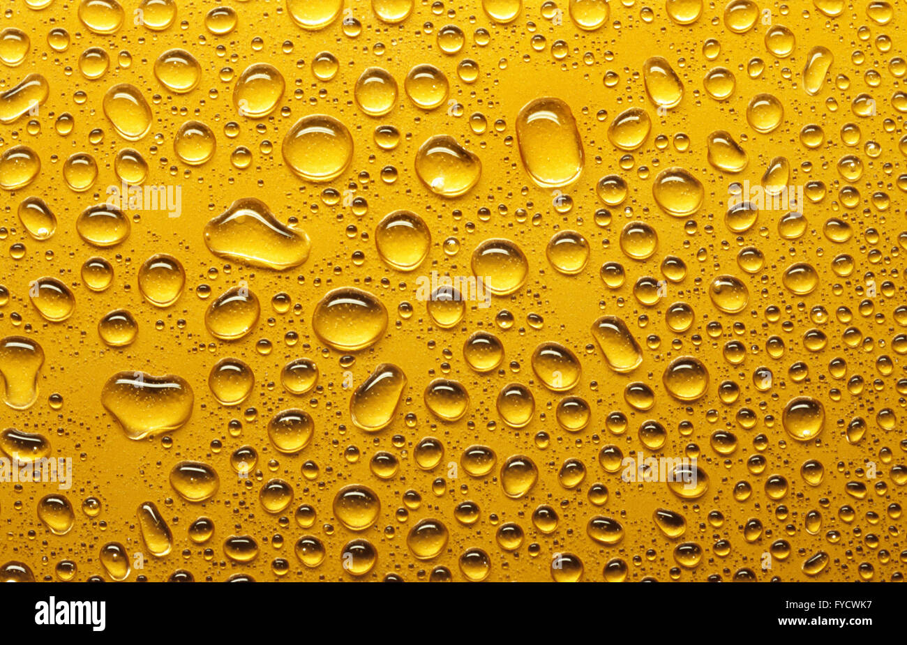 Waterdrops on a yellow background Stock Photo