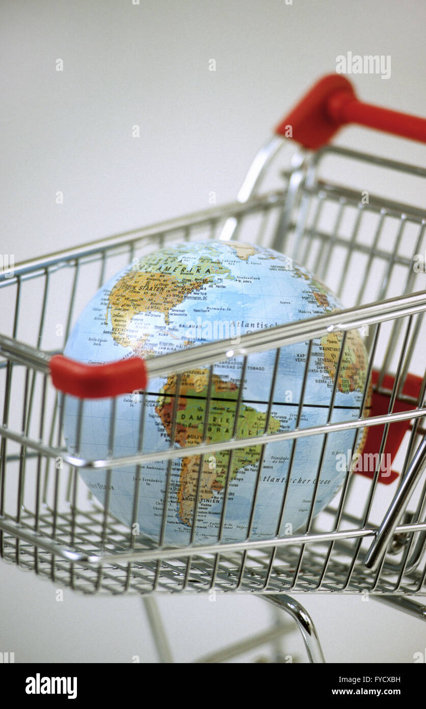 Globe in a shopping cart Stock Photo