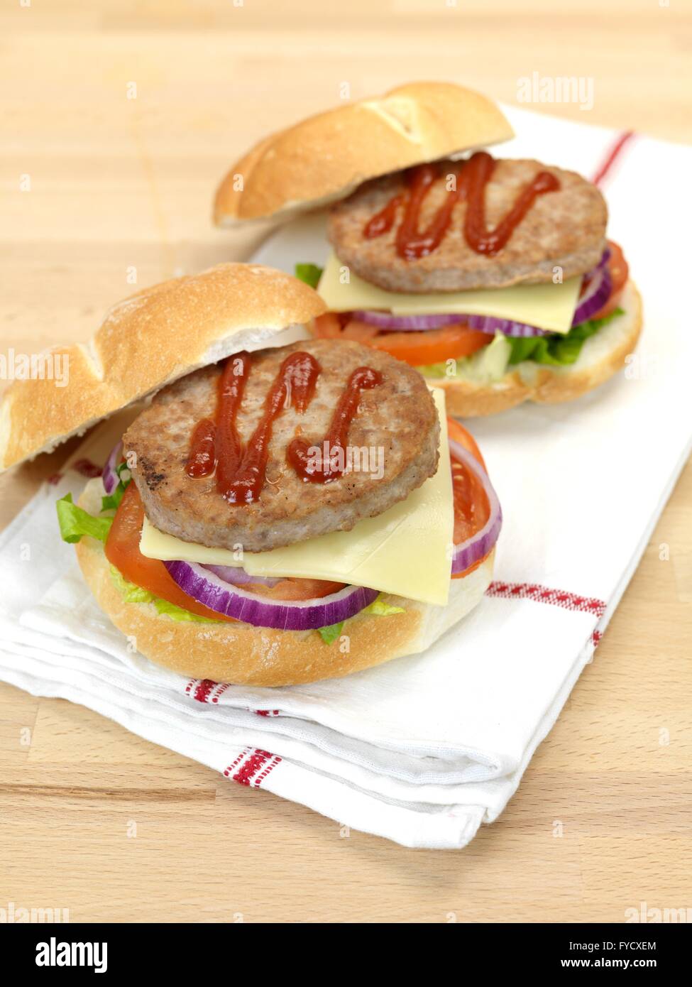 A freshly made American style hamburger with sauce Stock Photo Alamy