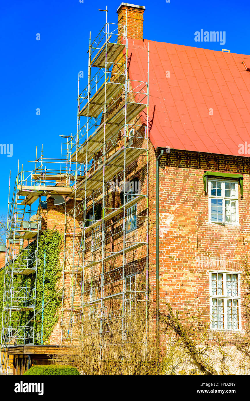 Trolle Ljungby, Sweden - April 12, 2016: The castle at Trolle Ljungby is being renovated. Scaffoldings are raised against the fa Stock Photo