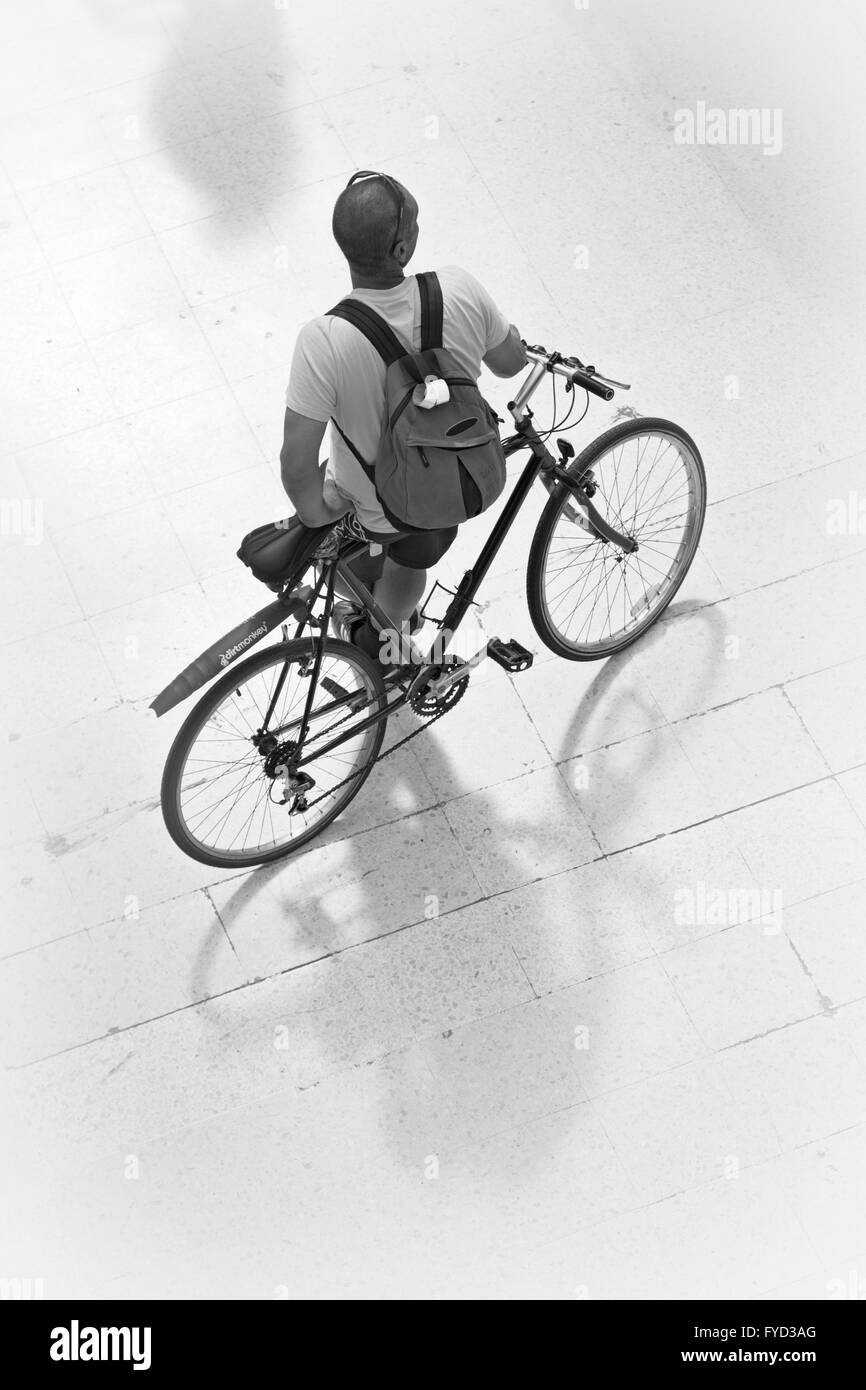 Cyclist at London Waterloo Station. Stock Photo