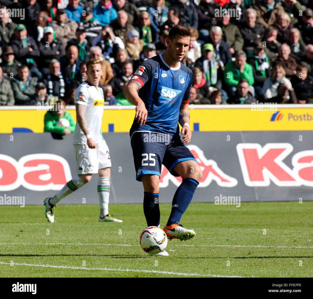 sports, football, Bundesliga, 2015/2016, Borussia Moenchengladbach versus TSG 1899 Hoffenheim 3:1, Stadium Borussia Park, scene of the match, Niklas Suele (TSG) in ball possession Stock Photo