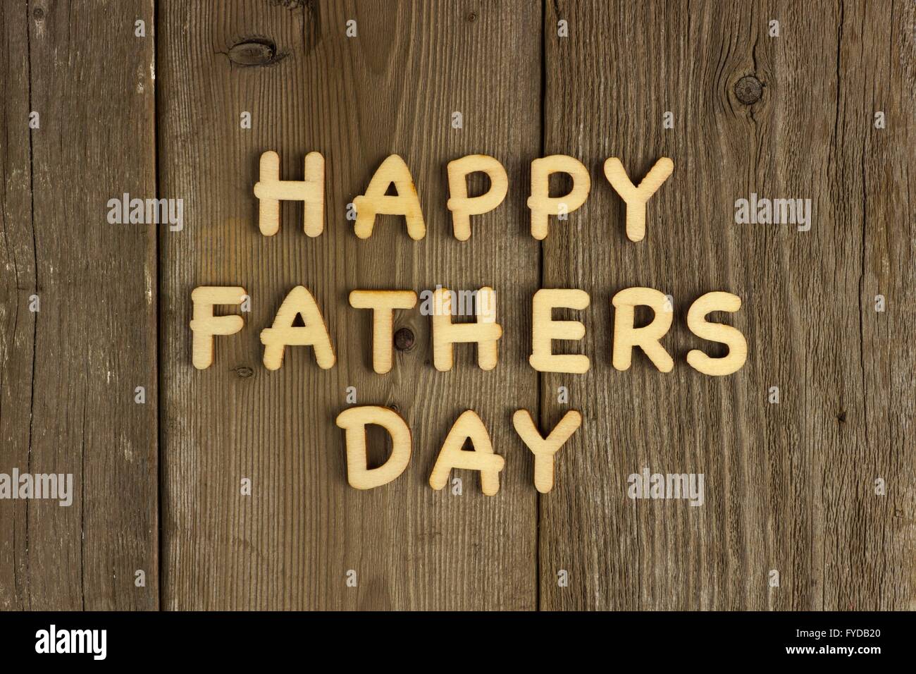 Happy Fathers Day wooden letters on a rustic wood background Stock Photo