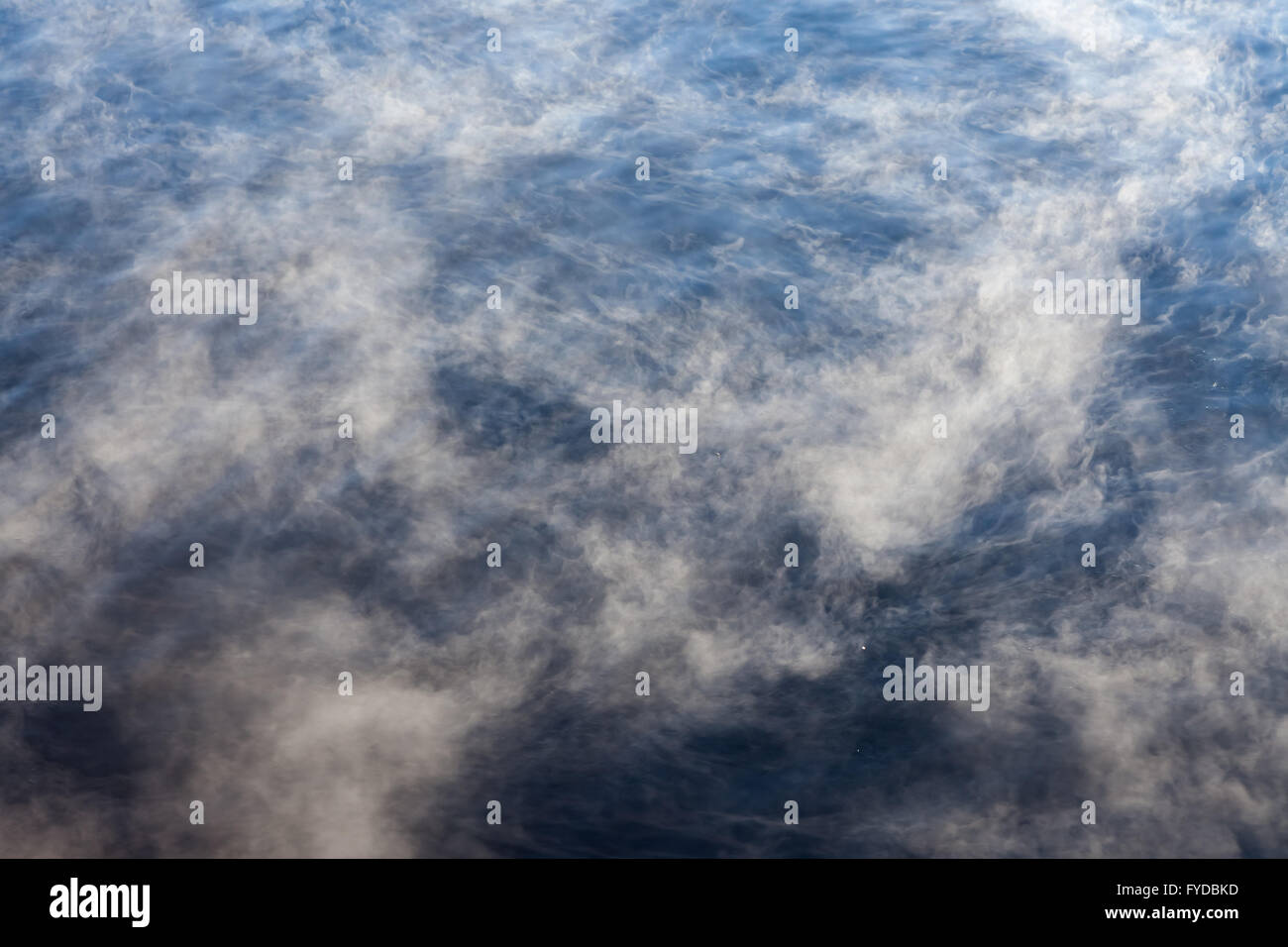 Water vapor on surface of cold water Stock Photo