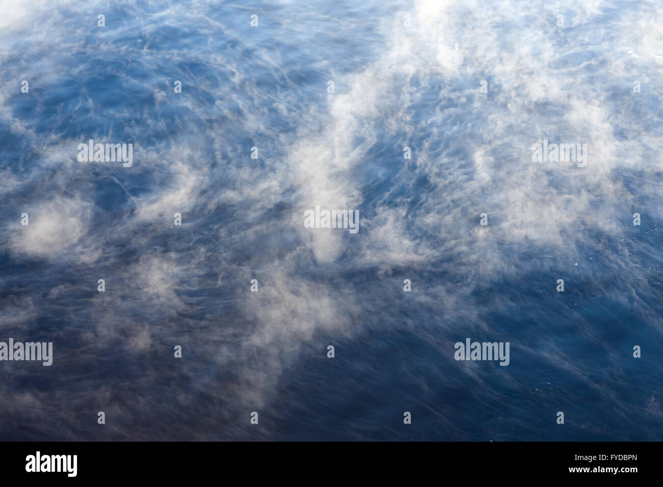 Water vapor on surface of cold water Stock Photo