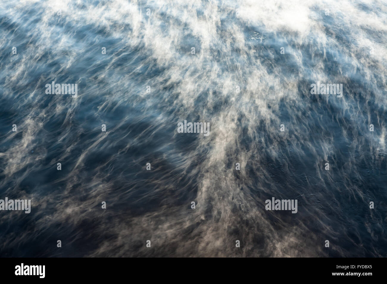 Water vapor on surface of cold water Stock Photo