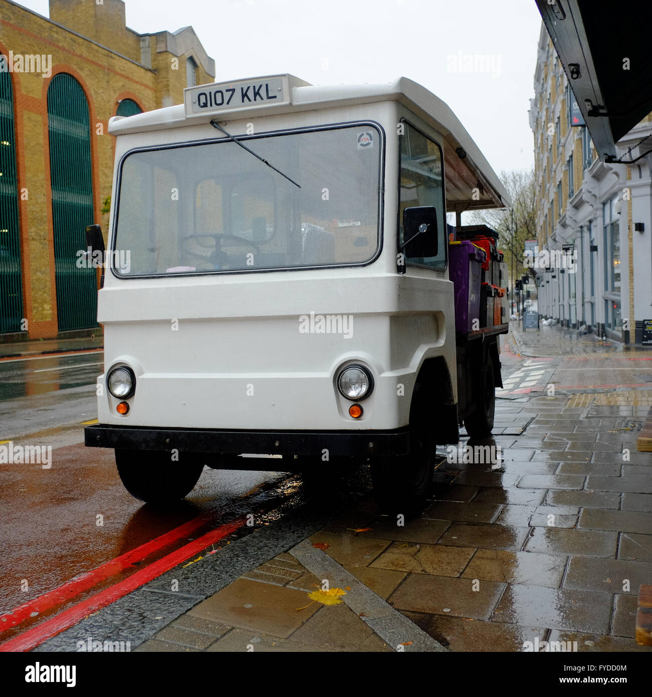 Traditional electric milk float making hires stock photography and