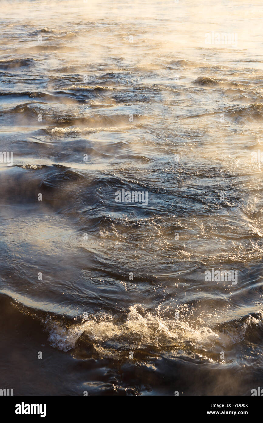 Water vapor on surface of cold water Stock Photo