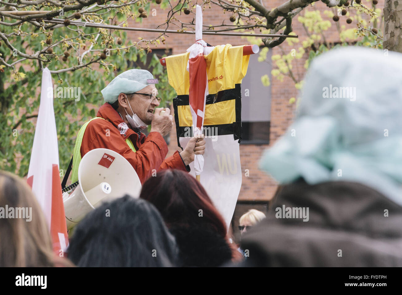 Berlin, Berlin, Germany. 26th Apr, 2016. Protesters during the demonstration of employees of Charite and Vivantes. The trade union ver.di has again expanded the scope of strikes in the civil service. Verdi asks six percent more pay for workers in the trade dispute, the third round of negotiations is scheduled for April 28 and 29, 2016 in Potsdam, Germany. Credit:  Jan Scheunert/ZUMA Wire/Alamy Live News Stock Photo