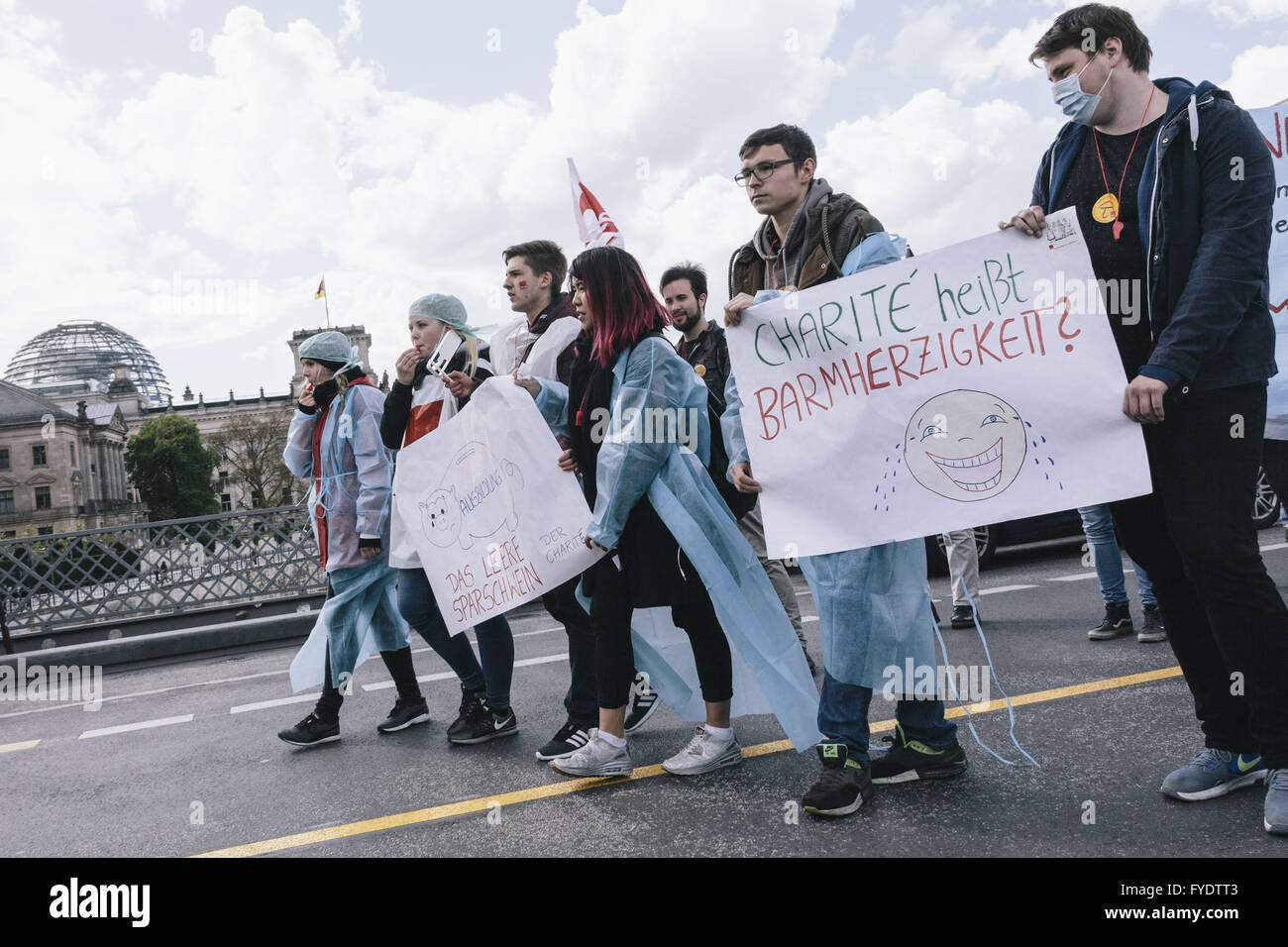 Berlin, Berlin, Germany. 26th Apr, 2016. Protesters during the demonstration of employees of Charite and Vivantes. The trade union ver.di has again expanded the scope of strikes in the civil service. Verdi asks six percent more pay for workers in the trade dispute, the third round of negotiations is scheduled for April 28 and 29, 2016 in Potsdam, Germany. Credit:  Jan Scheunert/ZUMA Wire/Alamy Live News Stock Photo