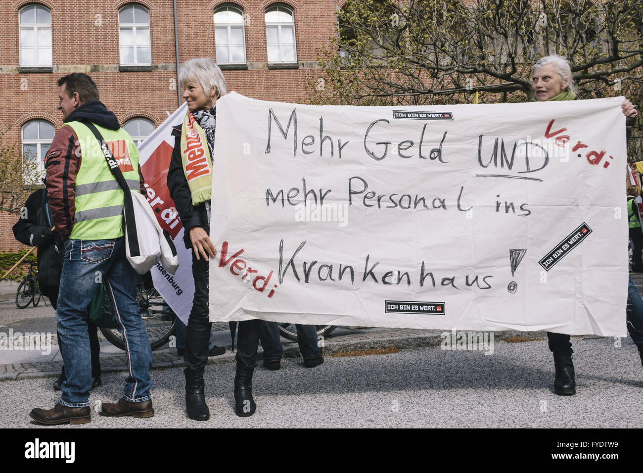 Berlin, Berlin, Germany. 26th Apr, 2016. Protesters during the demonstration of employees of Charite and Vivantes. The trade union ver.di has again expanded the scope of strikes in the civil service. Verdi asks six percent more pay for workers in the trade dispute, the third round of negotiations is scheduled for April 28 and 29, 2016 in Potsdam, Germany. Credit:  Jan Scheunert/ZUMA Wire/Alamy Live News Stock Photo