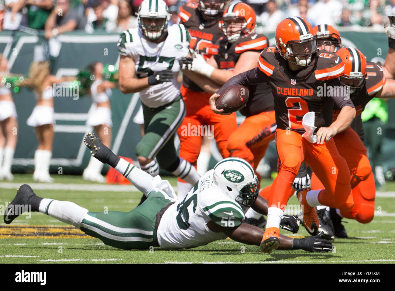 April 26, 2016 - Former Cleveland Browns quarterback Johnny Manziel indicted for domestic violence by a Dallas grand jury. Pictured: September 13, 2015, Cleveland Browns quarterback Johnny Manziel (2) scrambles with the ball as he gets past New York Jets inside linebacker Demario Davis (56), but the play will be nullified due to a flag, during the NFL game between the Cleveland Browns and the New York Jets at MetLife Stadium in East Rutherford, New Jersey. The New York Jets won 31-10. Christopher Szagola/CSM © Cal Sport Media/Alamy Live News Stock Photo