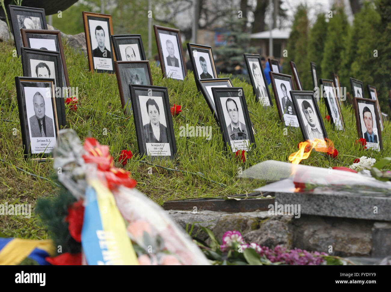Kiev, Ukraine. 26th Apr, 2016. Portraits of lost liquidators, victims of the Chernobyl nuclear disaster, at the Chernobyl victims memorial complex. Ukrainian mark the 30th anniversary of Chernobyl's tragedy, the biggest accident in the history of nuclear power generation, that killed thousands. Credit:  Vasyl Shevchenko/Pacific Press/Alamy Live News Stock Photo