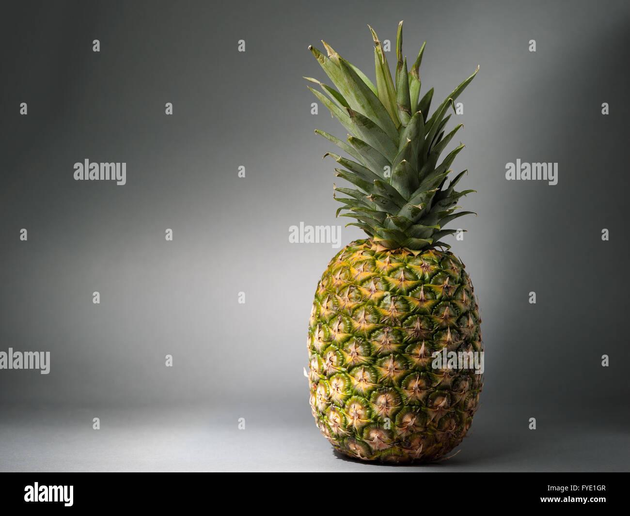 Unpeeled pineapple hi-res stock photography and images - Alamy