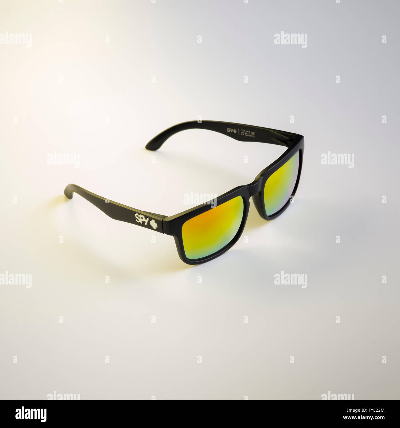 Close up detail of a pair of Spy Optics Sunglasses with Yellow Lenses Stock Photo