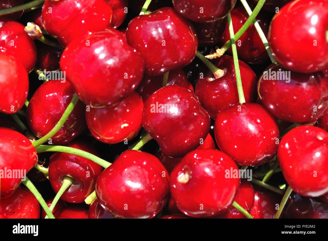 Texture from group of red ripe cherries Stock Photo