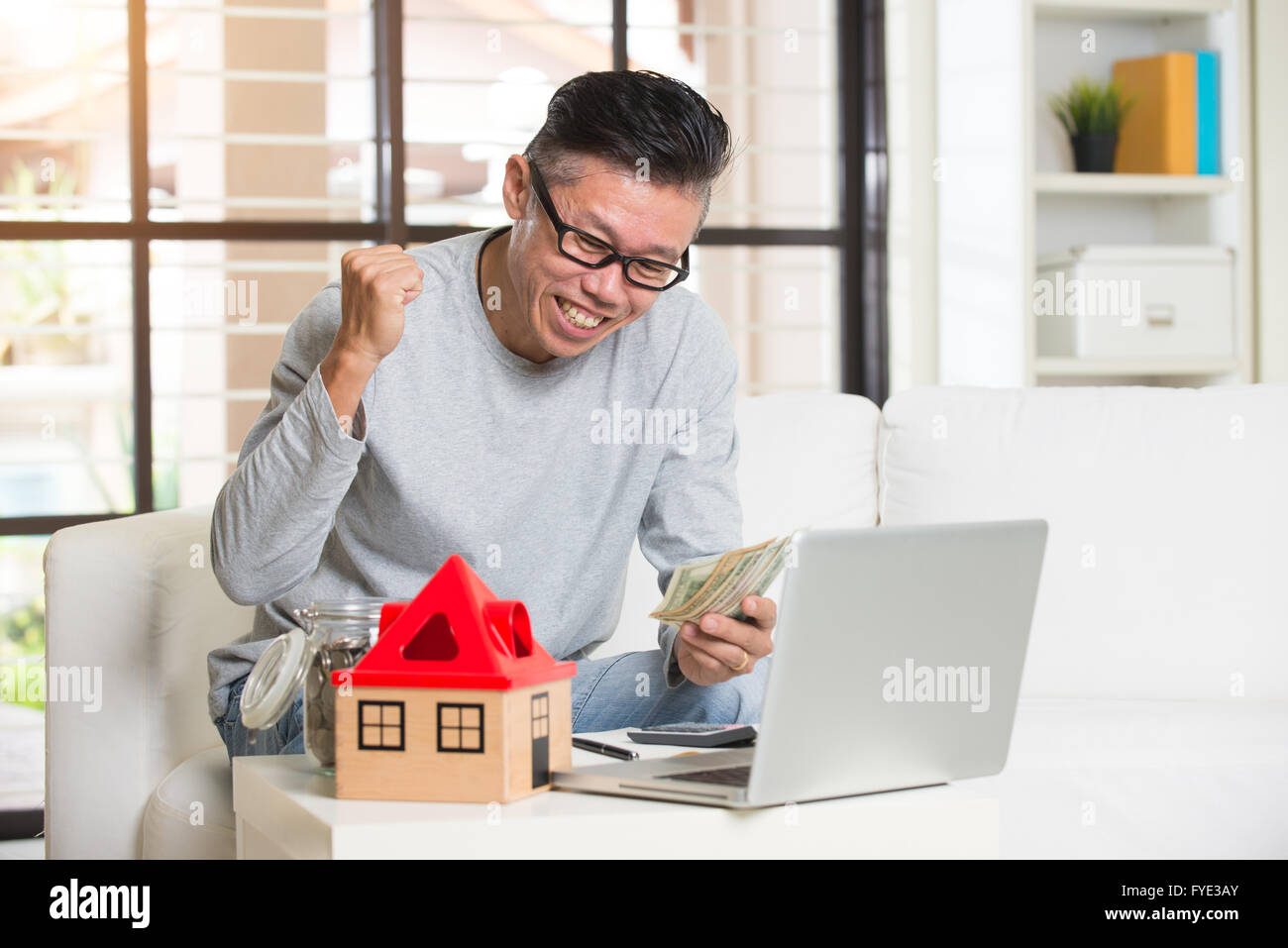 asian man with loan approved Stock Photo