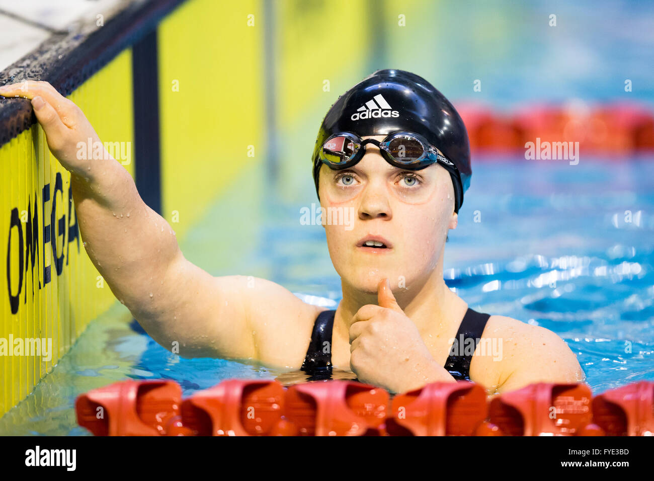 GLASGOW, UK: April, 23, 2016 Eleanor Simmonds gives the thumbs up at the Para-swimming trials after achieving Rio qualification. Stock Photo