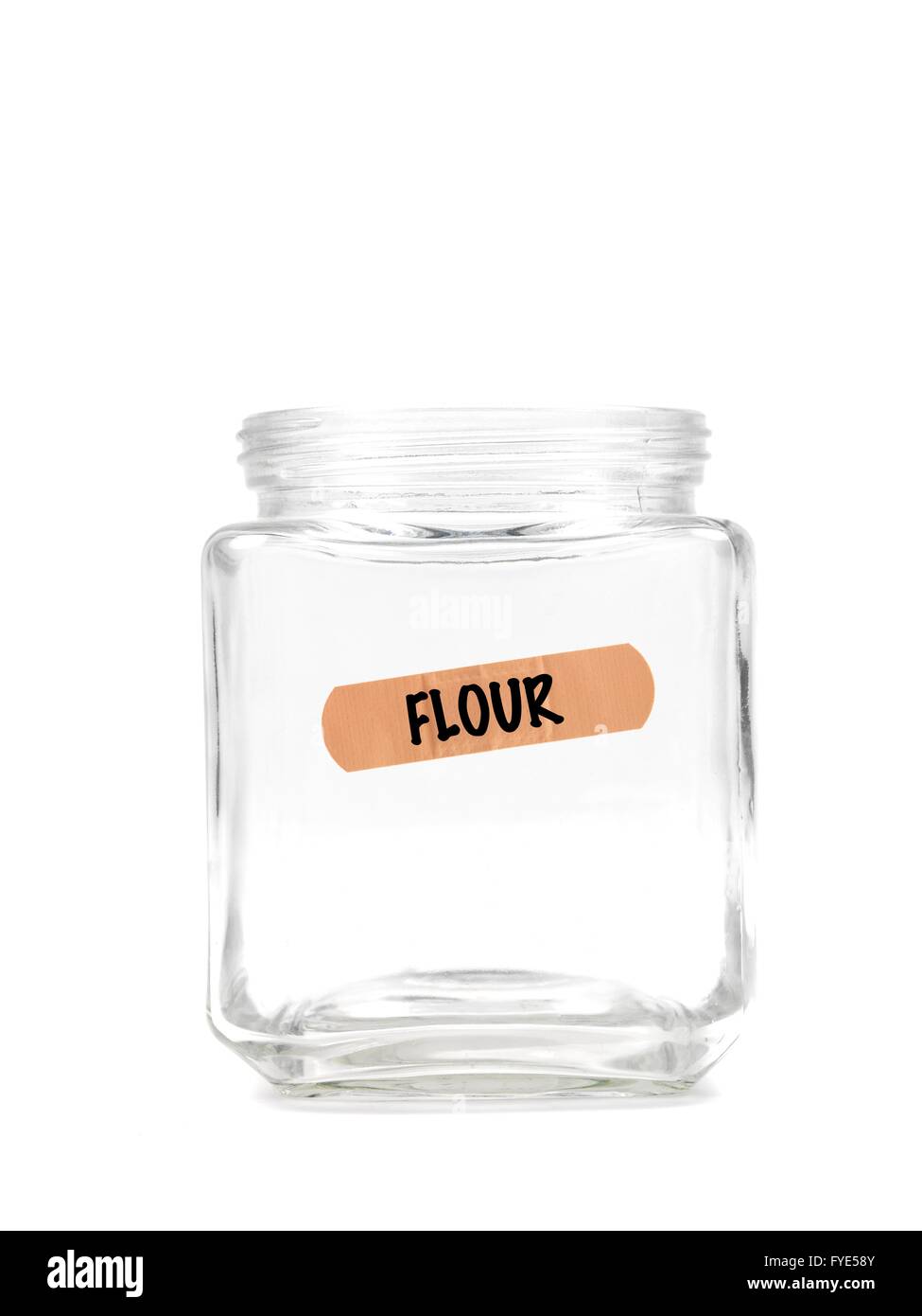 An empty jar with a flour label isolated against a white background Stock Photo