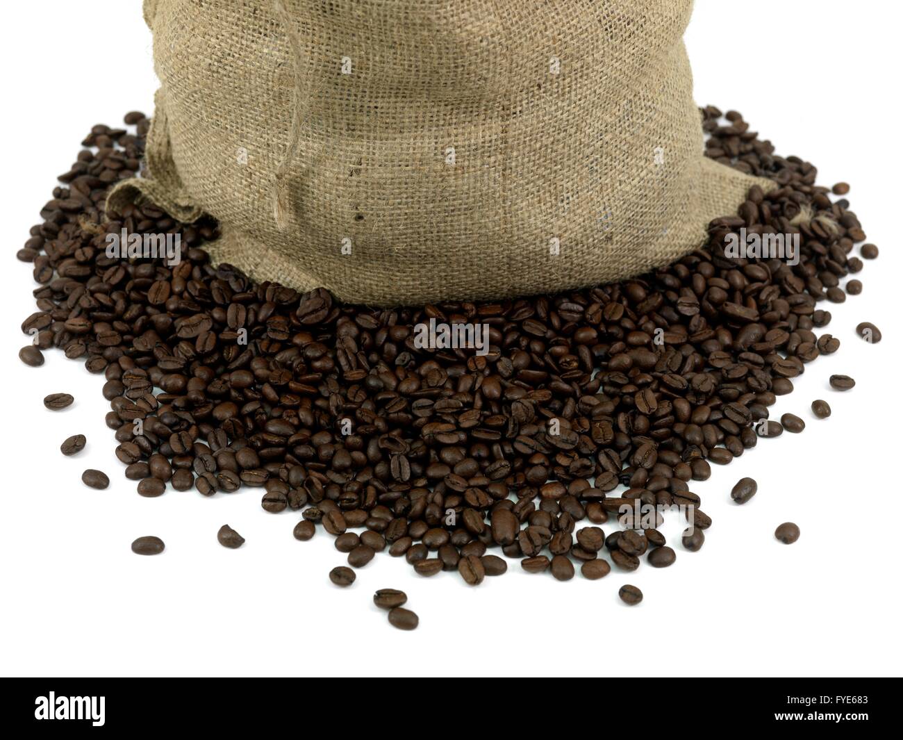 Coffee beans around a hessian bag isolated on white Stock Photo - Alamy