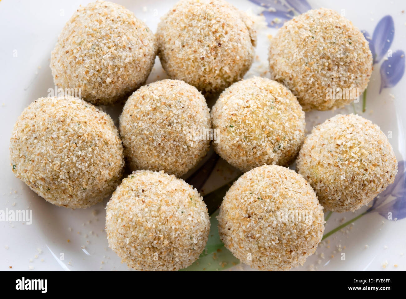 chicken meatballs breaded and ready to be fried Stock Photo