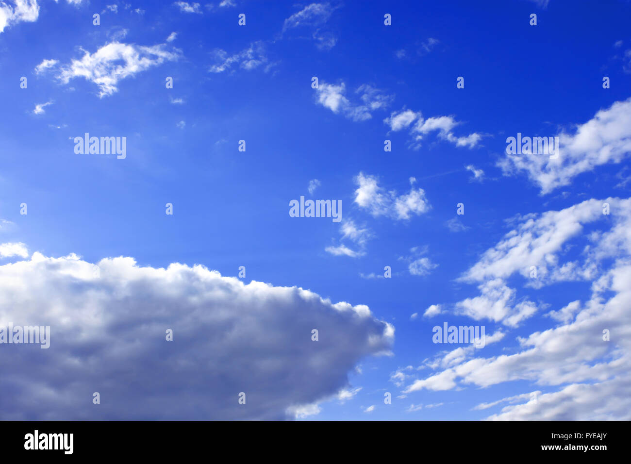 White clouds against blue sky Stock Photo - Alamy