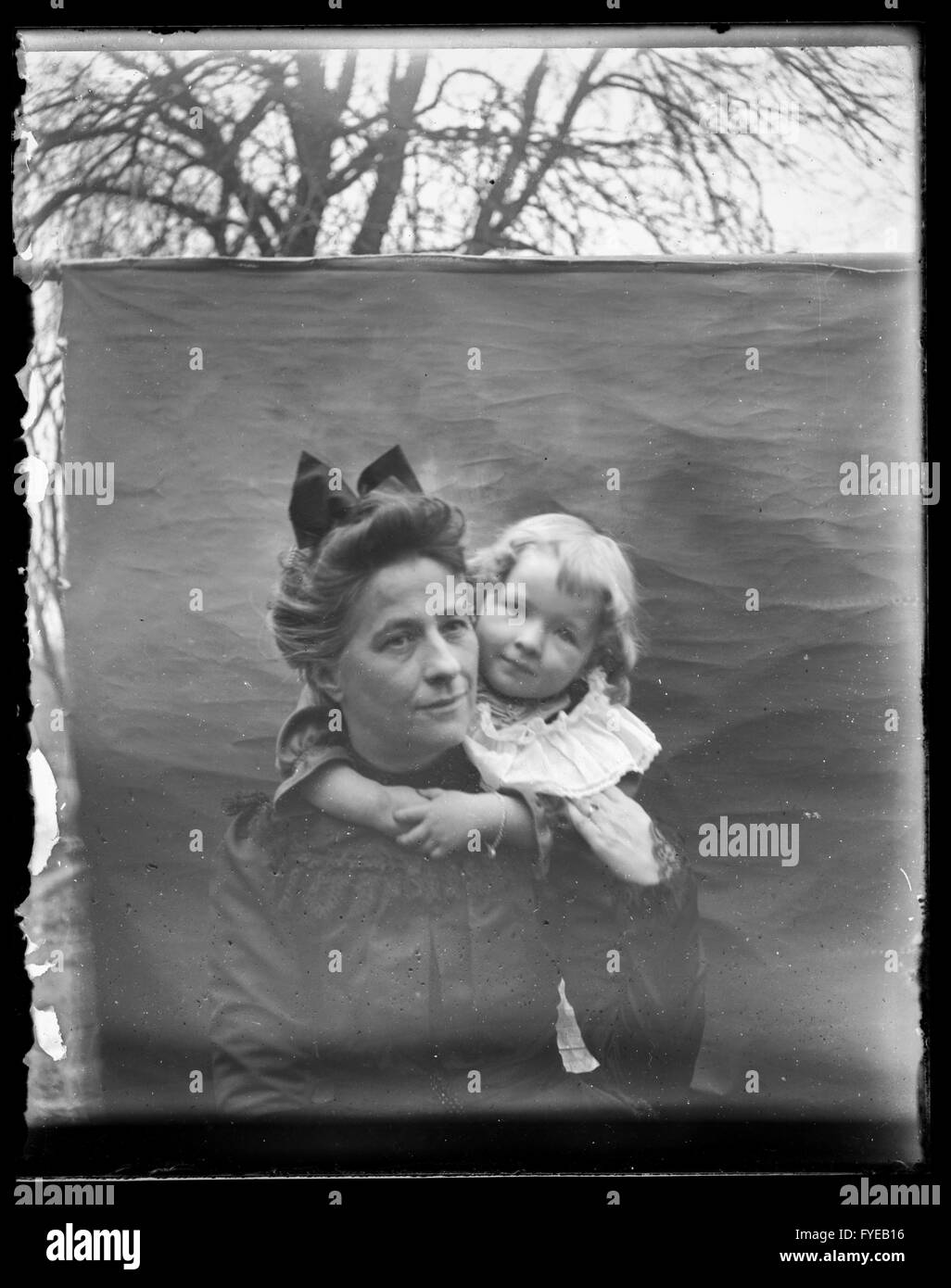 Victorian photograph of a woman and young child having their portrait taken. Stock Photo