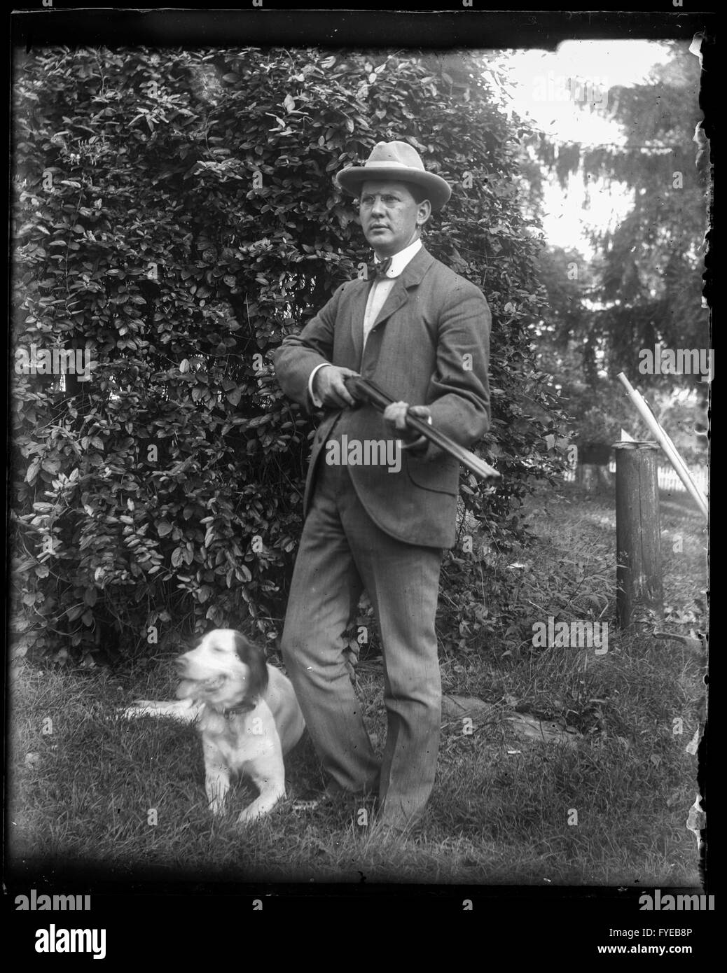 Victorian photograph of a man with a dog and a gun in Fallston, Maryland Stock Photo