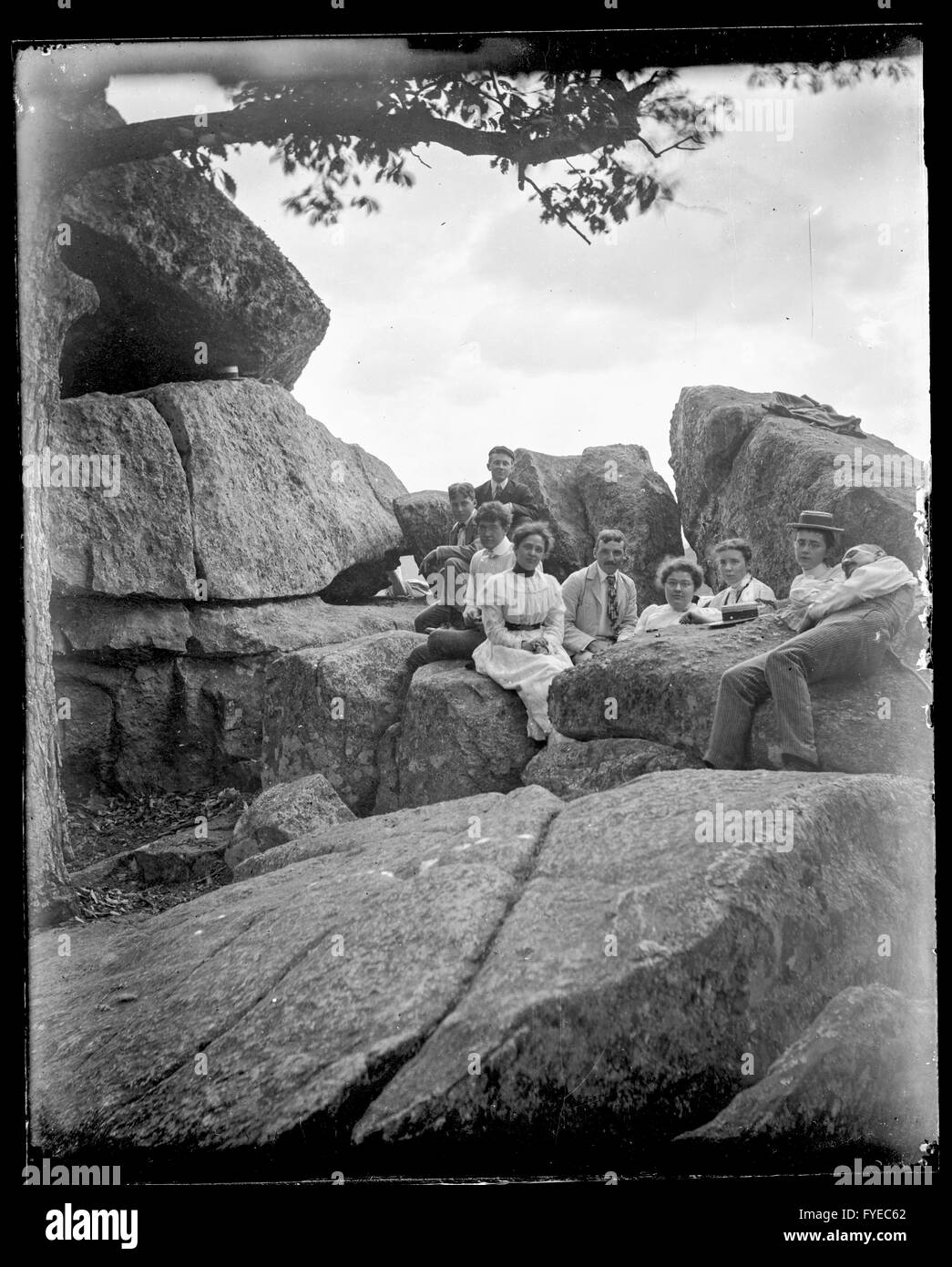 Victorian photograph of a group of people sitting on large rocks in Fallston, Maryland. Stock Photo