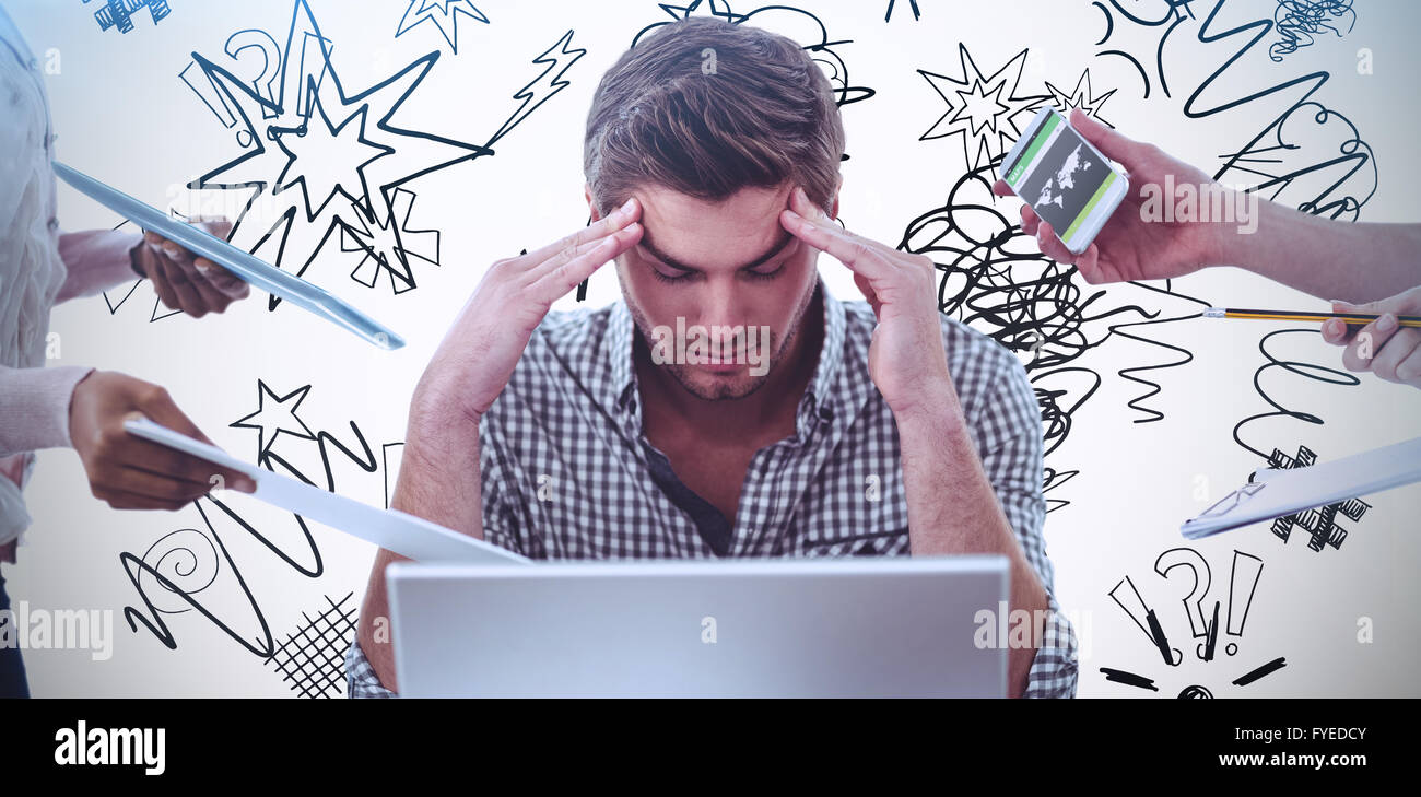 Composite image of businessman stressed out at work Stock Photo