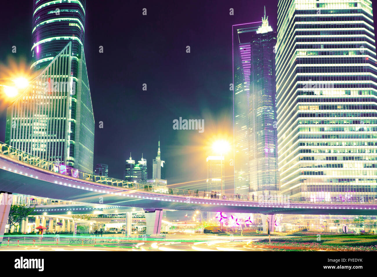 the light trails on the modern building background Stock Photo - Alamy