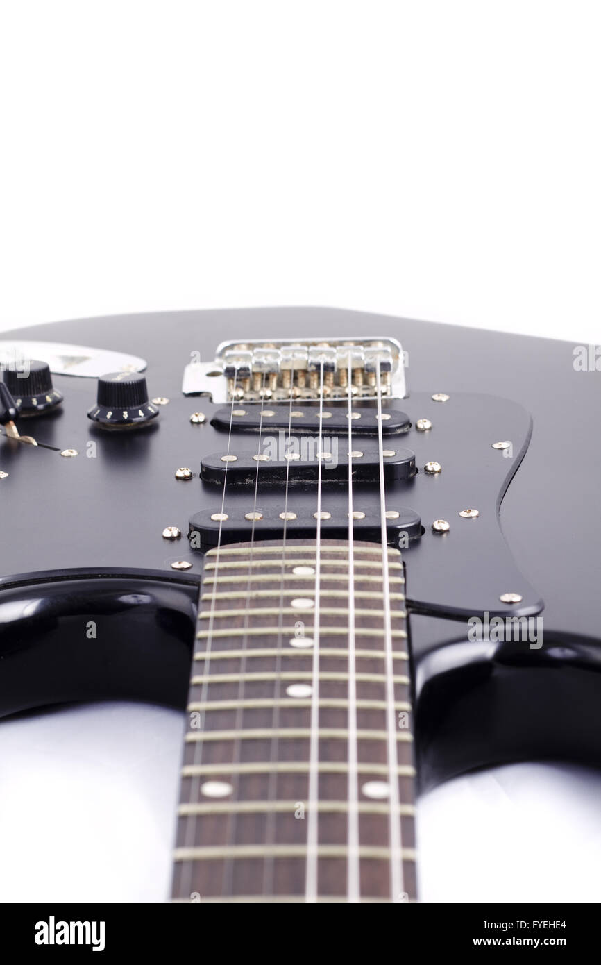 Black electric guitar on white background Stock Photo - Alamy